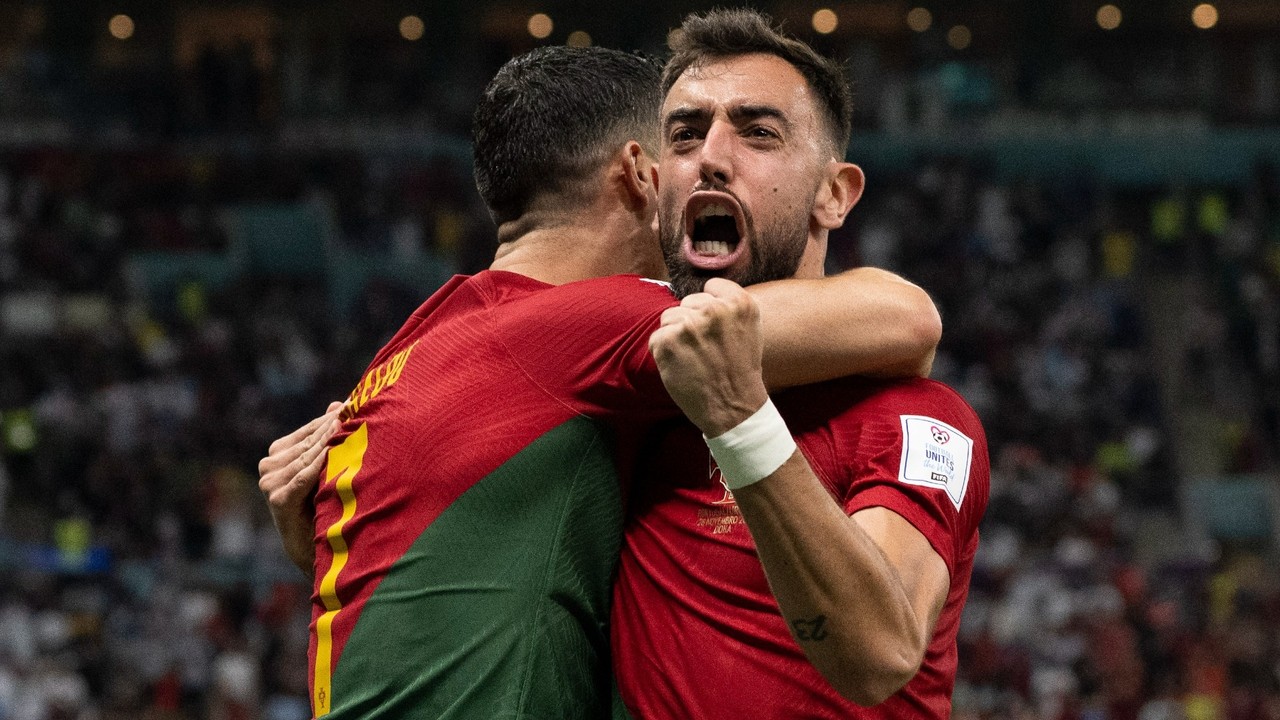 Portugal vs. Uruguay: Pitch invader with rainbow flag interrupts World Cup  match